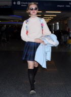 Elle Fanning Full of Smiles at LAX 