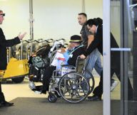 Quincy Jones Gets Pushed In A Wheelchair At LAX