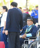 Quincy Jones Gets Pushed In A Wheelchair At LAX