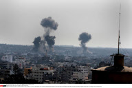 Smoke rises after an Israeli air strike in Gaza city