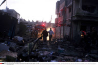 GAZA : Palestinians inspect the damage in a Palestinian house after an Israeli strike in Zeitun, outskirts of Gaza City