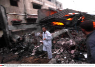 GAZA : Palestinians inspect the damage in a Palestinian house after an Israeli strike in Zeitun, outskirts of Gaza City