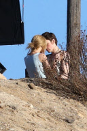 Taylor Swift gets a lift on the set of "I Knew You Were Trouble" 