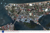 SATELLITE PHOTOGRAPHS SHOWING TSUNAMI HITTING CITY OF BANDA ACEH, INDONESIA - 26 DEC 2004