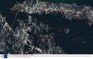 SATELLITE PHOTOGRAPHS SHOWING TSUNAMI HITTING CITY OF BANDA ACEH, INDONESIA - 26 DEC 2004
