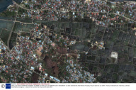 SATELLITE PHOTOGRAPHS SHOWING TSUNAMI HITTING CITY OF BANDA ACEH, INDONESIA - 26 DEC 2004