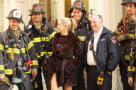 Sharon Stone Poses with the FDNY on her way to the Fading Gigalo Set