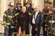 Sharon Stone Poses with the FDNY on her way to the Fading Gigalo Set