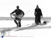 PRINCE KARIM AGA KHAN IV AND BEGUM SALIMA WALKING ON A FROZEN LAKE, ST MORITZ, SWITZERLAND - 1970