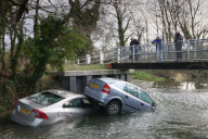 Two cars stuck in River Cam after owners ignored warnings and tried to cross flooded ford, Hinxton, Essex, Britain - 10 Dec 2012