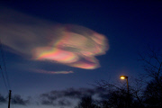 Nacreous 'rainbow' clouds photographed in sky above Aberdeen, Scotland - 09 Dec 2012