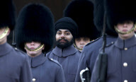 Buckingham Palace Guardsman Jatinderpal Singh Bhullar on parade and on guard for the first time, London, Britain - 11 Dec 2012