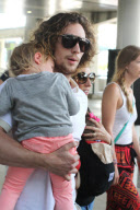 Aaron Taylor-Johnson and Family Arrive in Vancouver