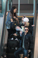 *EXCLUSIVE* Michael Bublé greets his wife with flowers at Vancouver Airport [NO Canada]
