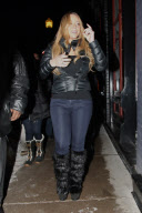 Mariah Carey takes the time to pose for pictures