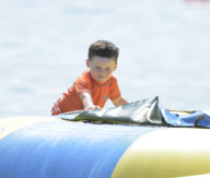 Coleen Rooney and Kai at the beach