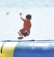 Coleen Rooney and Kai at the beach