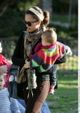 Actress JESSICA ALBA has bottle time at playground with HONOR