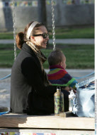 Actress JESSICA ALBA has bottle time at playground with HONOR