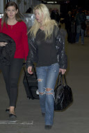 Tara Reid looks frazzled at LAX