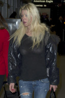 Tara Reid looks frazzled at LAX