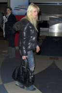 Tara Reid looks frazzled at LAX