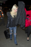 Tara Reid looks frazzled at LAX