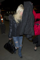 Tara Reid looks frazzled at LAX