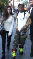 Lil Wayne checks out the Lakers on Christmas