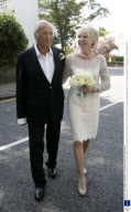 Michael Winner And His Bride Geraldine Arrive Back At Their Home In Kensington After Wedding At Chelsea Registry Office.