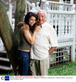 MICHAEL WINNER AND GIRLFRIEND PAOLA LOMBARD AT HIS HOME IN KENSINGTON, LONDON, BRITAIN - 2005