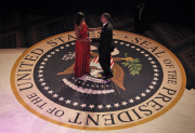 Barack and Michelle open ball