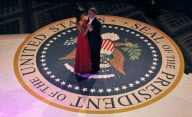 Barack and Michelle open ball