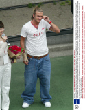 England Captain David Beckham In Tokyo. David Beckham Spoke For The First Time About His Move To Real Madrid On Thursday Saying He Was Looking Forward To The Challenge. Beckham Accompanied By His Wife Victoria Is In Tokyo On A Week Long Promotional T