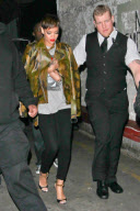Stylish Rihanna hits My Studio nightclub with a group of friends