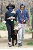 *EXCLUSIVE* An Inconspicuous Anne Hathaway and Adam Shulman take a stroll with Esmeralda 