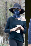 *EXCLUSIVE* An Inconspicuous Anne Hathaway and Adam Shulman take a stroll with Esmeralda 