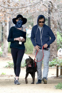 *EXCLUSIVE* An Inconspicuous Anne Hathaway and Adam Shulman take a stroll with Esmeralda 