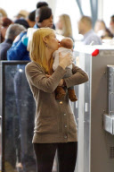 Claire Danes Kisses Baby Cyrus Dancy At LAX