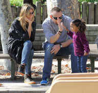 Heidi Klum's Halloween picture is printed on the custom case of Martin Kristen's phone