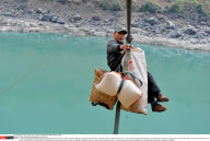China Crossing the Nujiang River via a zip-line