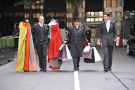 Savoy hotel doormen taking clothing and products to be used at the EE BAFTA awards, to the styling suites, London, Britain-8th Feb 2012