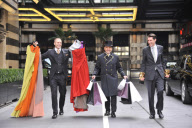 Savoy hotel doormen taking clothing and products to be used at the EE BAFTA awards, to the styling suites, London, Britain-8th Feb 2012