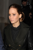 Jennifer Lawrence takes a tumble as she falls over loosing her shoes.