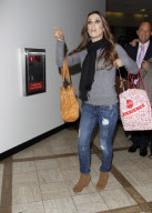 Brooke Mueller with super crazy eyes at LAX