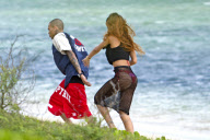Chris Brown holds Rihanna's hand on her birthday in Hawaii