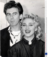 Singer Madonna Pictured At A Press Conference With Musician George Harrison. Harrison Was Executive Producer Of Handmade Films Who Produced Shanghai Surprise Which Starred Madonna.