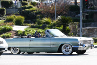 *EXCLUSIVE* Travis Barker and kids are Low Riders