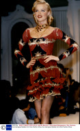 Eva Herzigova Models At A Paris Fashion Show.