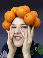 Woman dresses up as celebrities, Britain - 27 Feb 2013